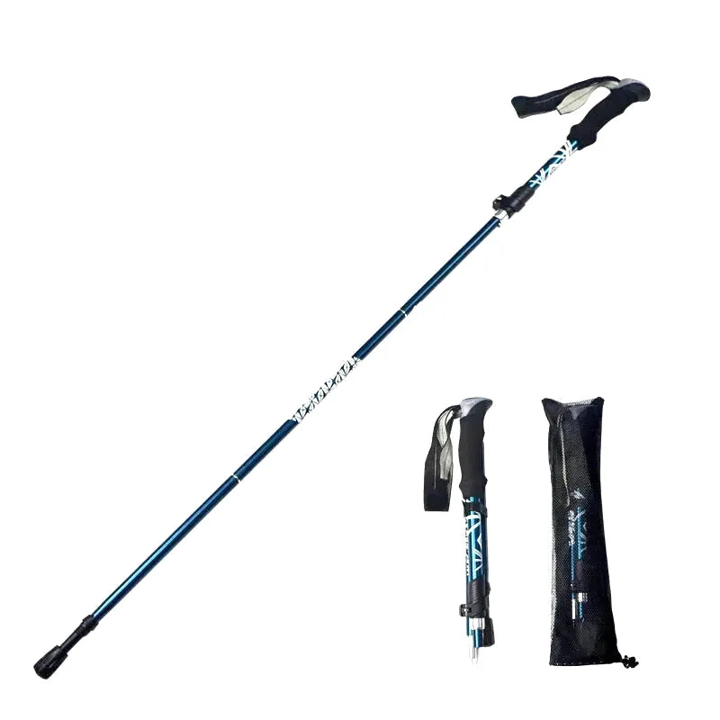 Blue telescopic hiking pole with black ergonomic grip and silver accents, featuring a compact carrying sleeve