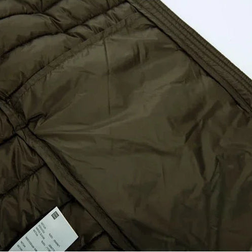 Veste Randonnée Homme en Duvet Compressible - Duvex UltraLight Pro, détail de tissu et coupe compacte.