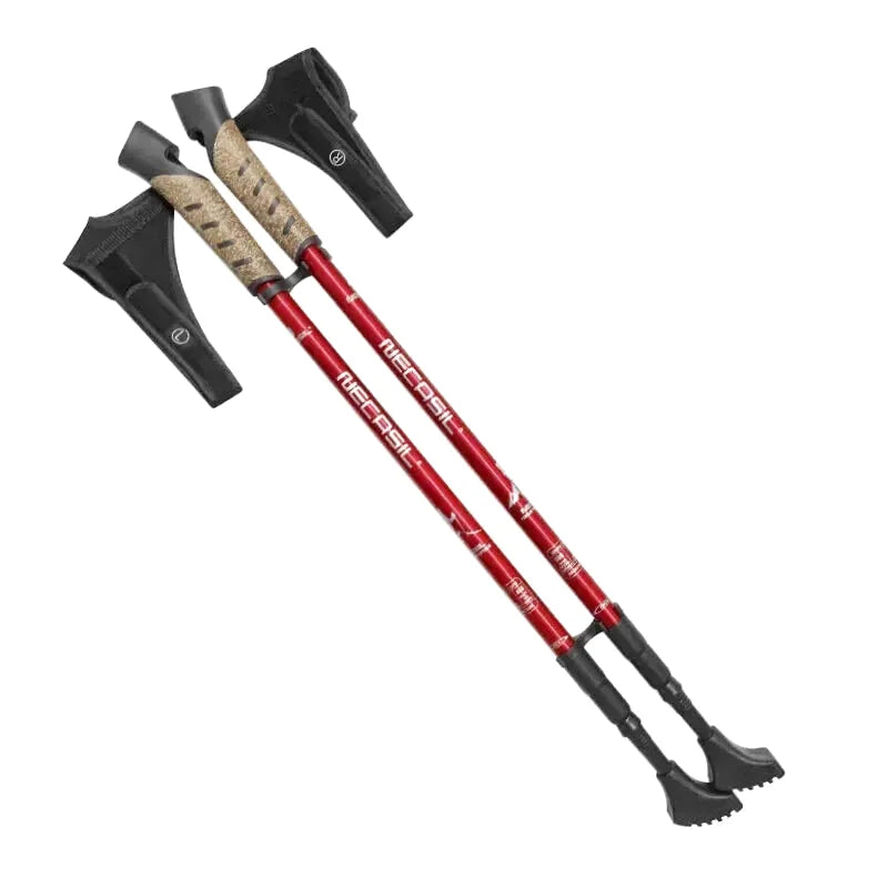 Red and black trekking poles with camouflage-patterned grips, branded ’meccasil’ along the shafts