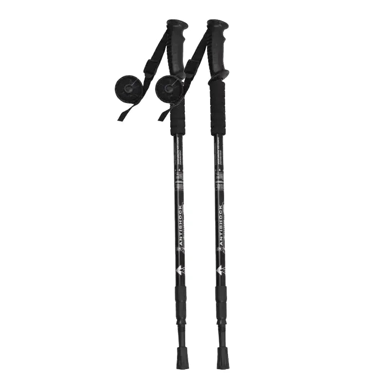 Black antishook brand telescopic hiking poles with textured grip handles and adjustable length sections