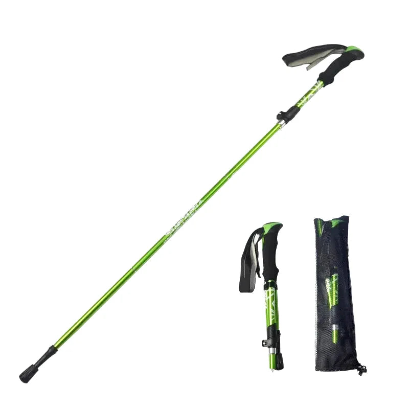 Green and black adjustable trekking pole with ergonomic grip and carrying sleeve