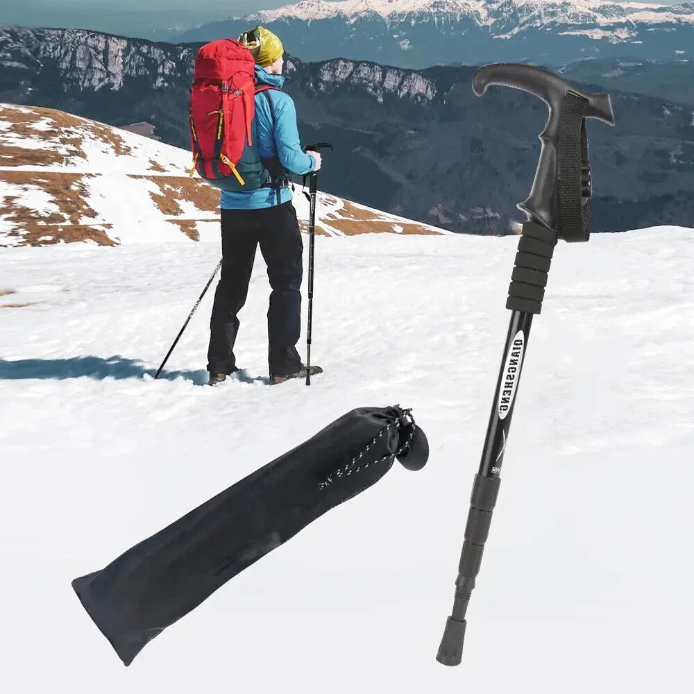 Black telescopic hiking pole with textured grip and branded label, accompanied by a black carrying sleeve